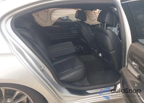 2014 BMW 740Li из США, поврежденный, VIN WBAYE4C58ED138126